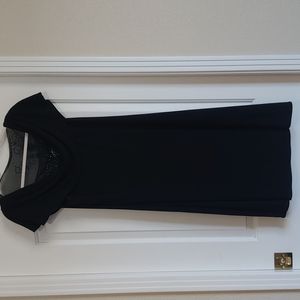 Scarlett Nite black figure-forgiving cocktail dress